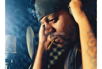 Rapper with joint in recording booth