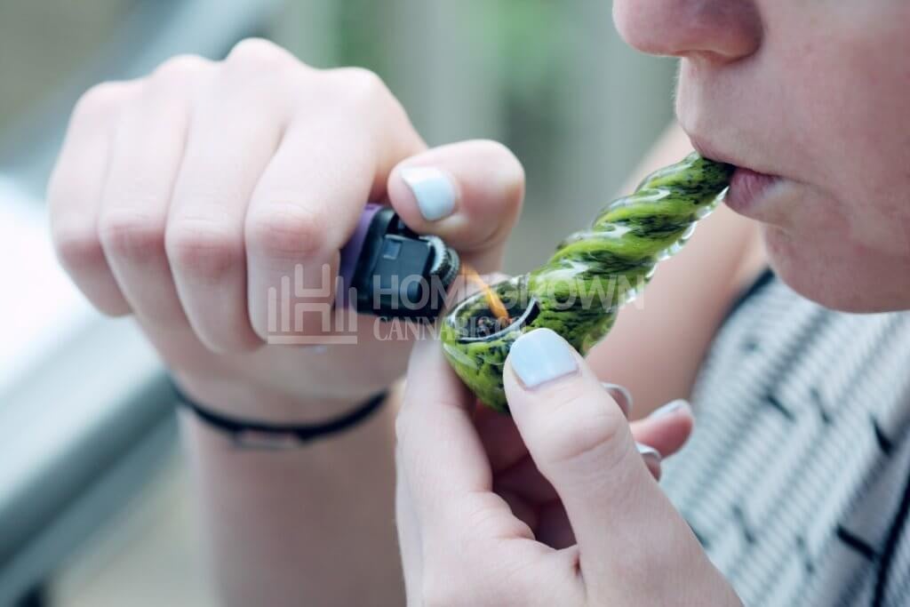 Smoking marijuana in a pipe